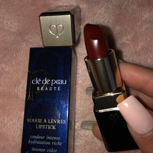 Lipstick, eye cream, eye shadow